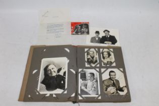 An album of stars of stage and screen photographs and ephemera to include a large photograph of Stan