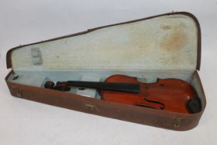 Violin having two piece back, no interior label, brass mounts stamped 'DRGM No 728940' in fitted