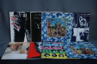 Collection of Rolling Stones and Rolling Stones related to include Sticky Fingers with working zip