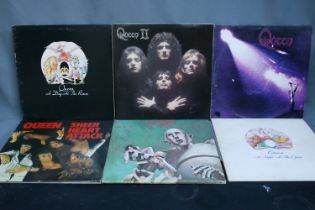 Collection of Queen records to include A Day at the Races, Sheer Heart Attack, A Night at the Opera,