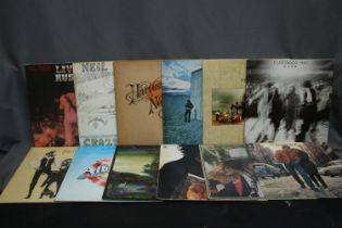 Box containing a quantity of records mainly from the 70's to include David Bowie, Neil Young, The