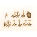 9ct gold Masonic pendants and charms to include tablet, compass etc. 18g gross