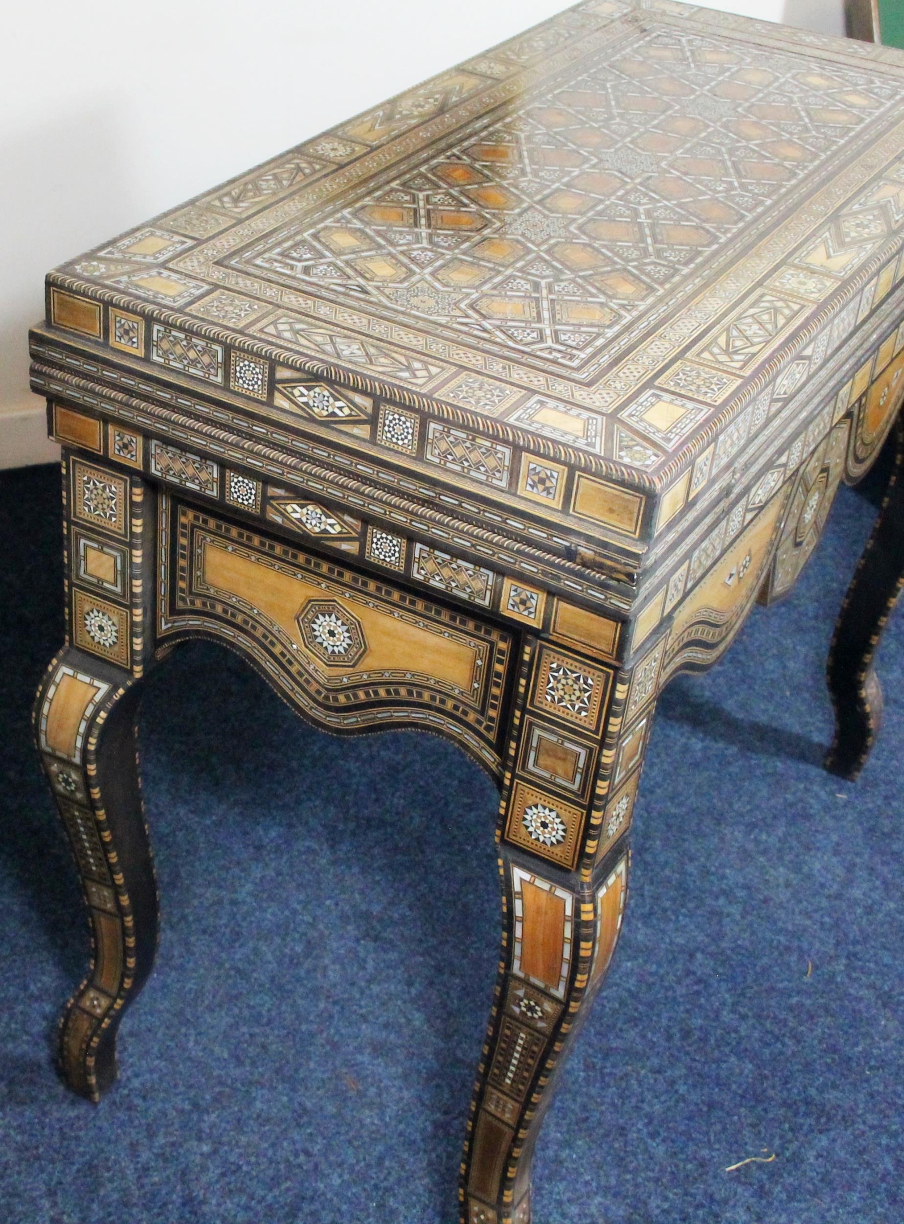 Syrian folding games table of Moorish design, mid 20th century, the elaborately inlaid mother of - Image 4 of 8