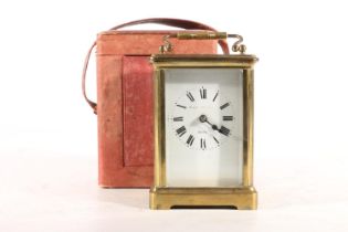 Early 20th century French brass cased carriage clock, the white dial with black Roman numerals and