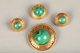 Victorian malachite and yellow metal Etruscan revival brooch and earrings set, the cabochon round