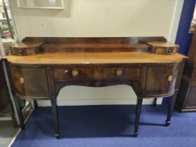 Scottish George III and later mahogany sideboard, the shaped upstand with two short drawers, above