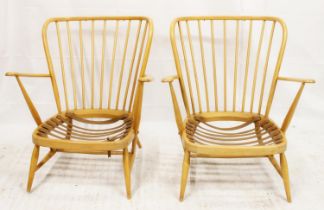 Pair of Ercol mid-century beech armchairs, the high hoop back rail leading to Windsor style