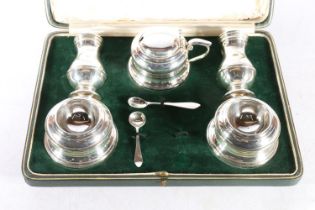 George V silver breakfast cruet set, consisting of salt and pepper, twin egg cups and hinged