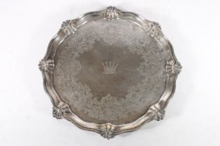 Large Victorian silver salver, of circular form with shell form acanthus and wavy rim cast border