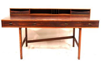 1960s Danish rosewood veneer flip-top partner desk, designed by Jens Quistgaard for Peter Lovig