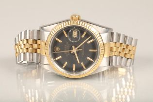 Rolex Oyster Perpetual Datejust automatic wristwatch chronometer, the black enamel dial with gold