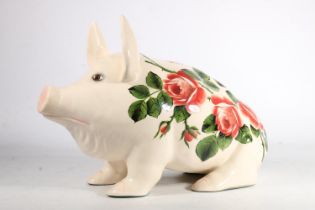 Large Griselda Hill Wemyss pottery pig, the body hand painted with roses, L45cm, H29cm.
