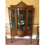 Sheraton Revival mahogany and inlaid display cabinet, the ledgeback arch top above a central