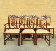 Set of seven 20th century mahogany dining chairs to include a carver armchair, each in the Chinese