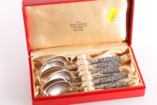Set of six Swedish silver 830 standard coffee spoons, the finials of reticulated scroll and floral