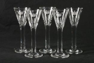 Set of five cordial glasses, 19th century, the conical bowls engraved with crest of 'N' within
