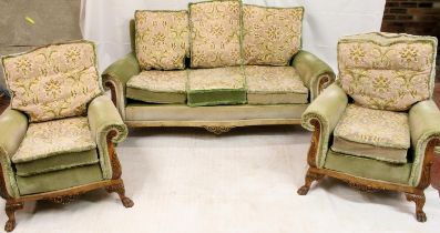 Early 20th century walnut framed suite, the upholstered cushions and stuffed seats on an acanthus