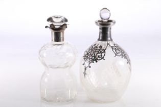 Glass decanter of waisted form with hallmarked silver four spout collar, Chester 1903, together with