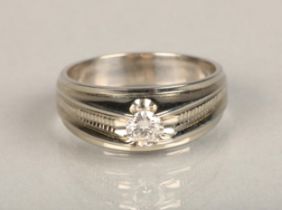 18ct white gold diamond solitaire ring, the brilliant cut diamond set in an integral mount flanked