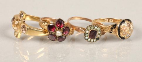 Four antique unhallmarked yellow metal rings set with semi-precious stones and pearls, one of