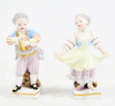 Pair of Meissen porcelain figurines of children, 19th century, the boy playing a flute with the girl