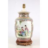 Chinese porcelain Famille Rose table lamp, mid 20th century, of baluster shape, the reserve panels