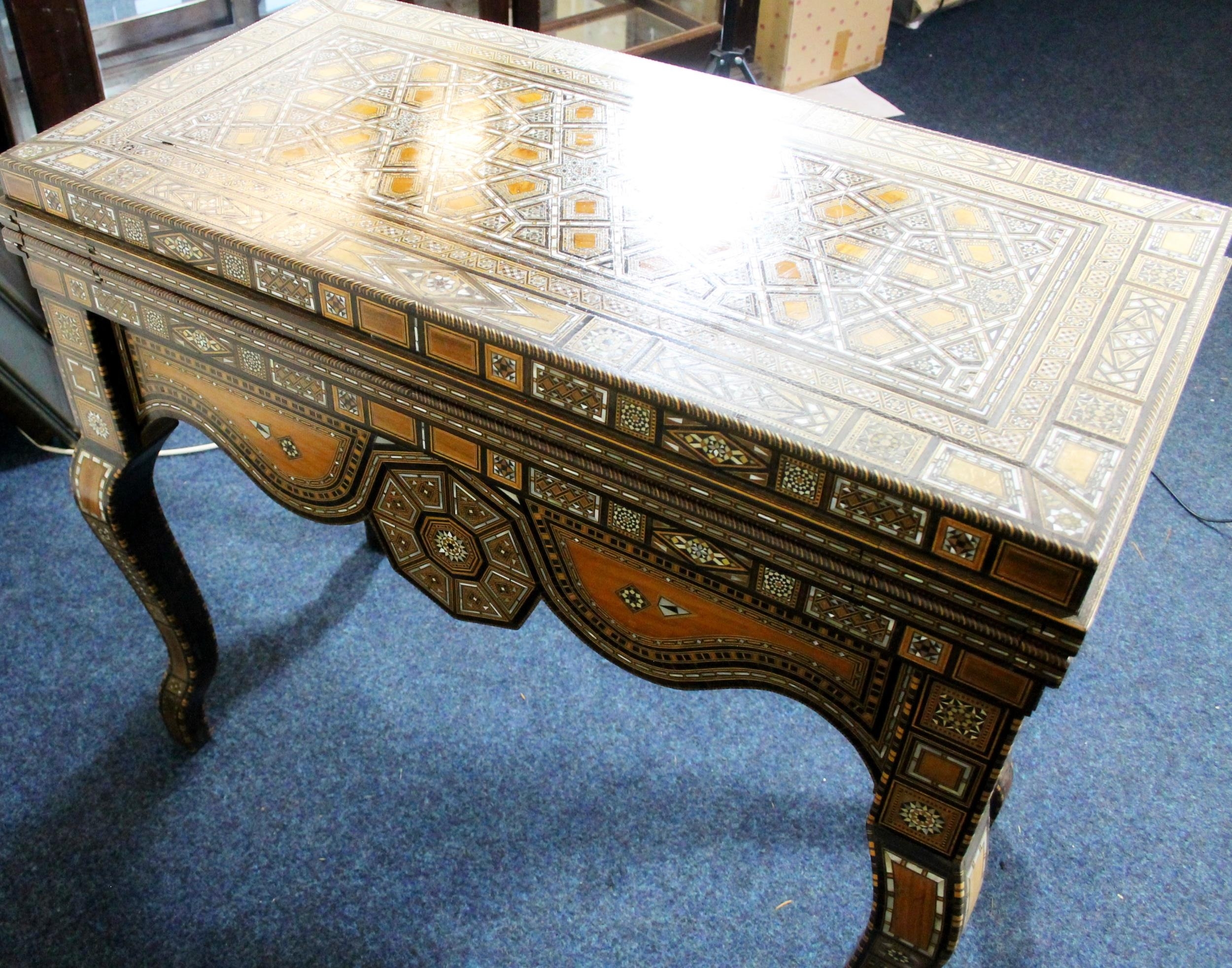 Syrian folding games table of Moorish design, mid 20th century, the elaborately inlaid mother of - Image 5 of 8