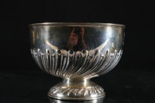 Edwardian silver rose bowl, the bowl embossed with half fluted and reeded wrythen design on circular