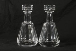 Pair of Baccarat cut glass 'Tallyrand' decanters, mid-20th century, the geometric cut stoppers on