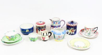 Mak' Merry Scottish Art Pottery, c1920s, consisting of preserve jars, jugs, cups and saucers etc.