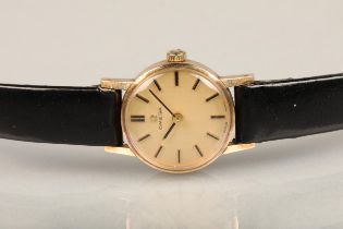 Omega 9ct gold cased ladies' wristwatch, the 17-jewel round watch with champagne dial, baton hands