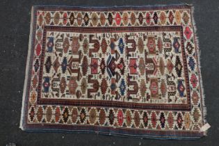 Caucasian rug, the cream ground with polychrome geometric designs within conforming border, 140cm