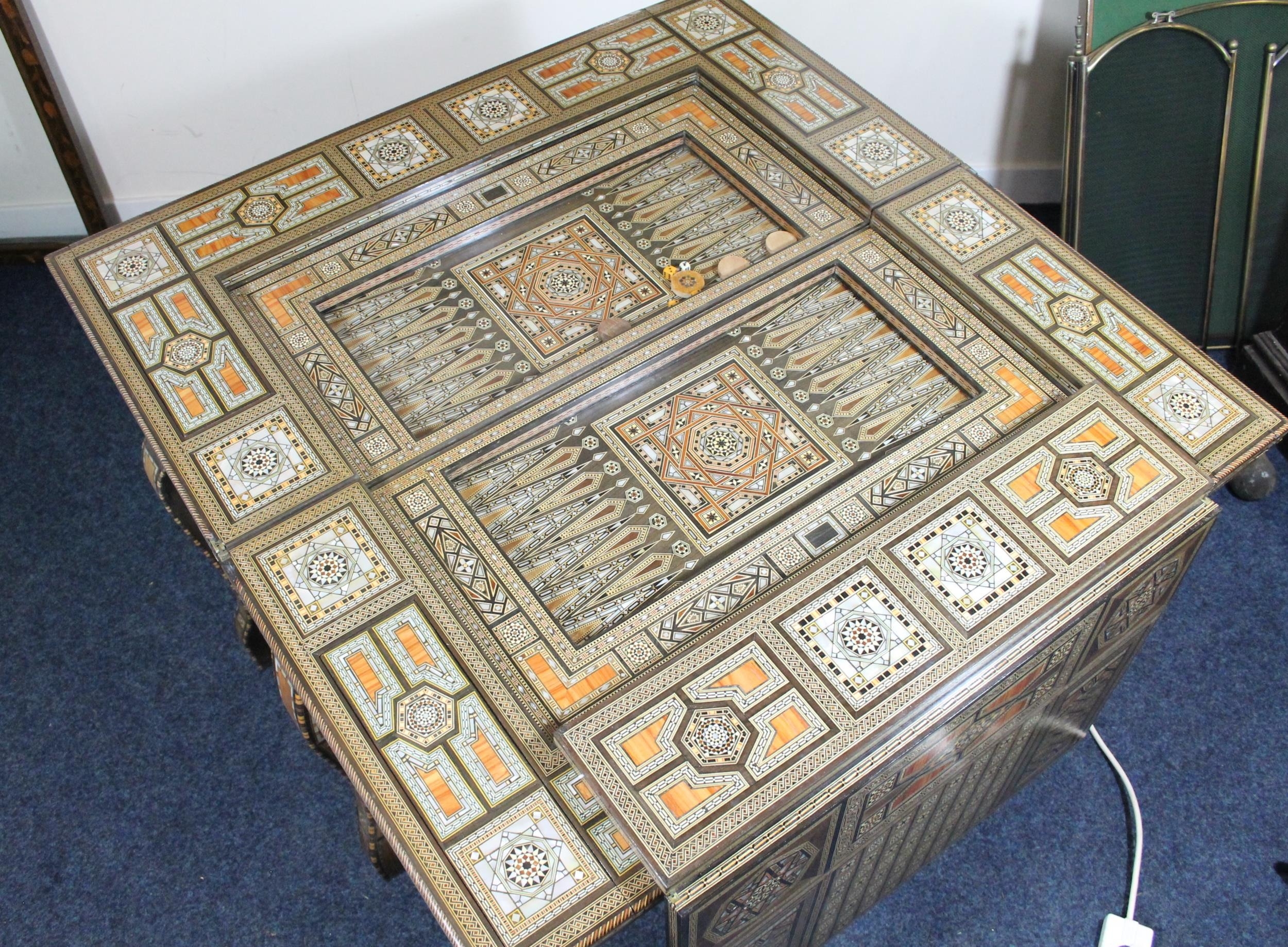 Syrian folding games table of Moorish design, mid 20th century, the elaborately inlaid mother of - Image 7 of 8