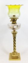 Victorian brass oil lamp, of wrythen Corinthian column form on stepped base, clear slice cut