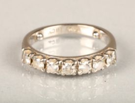 18ct white gold seven stone diamond ring, each diamond approximately 0.1cts, ring size L/M, 4.7g