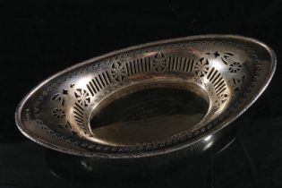 George V silver breadbasket, of navette shape, the fluted and wheatsheaf rim border on a shaped