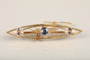 An Art Deco period sapphire and diamond 18ct gold bar brooch, the  symmetrical wire work navette