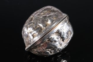 Victorian novelty parcel gilt silver box in the form of a walnut shell having gilded interior, by