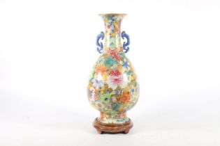 Chinese Millifleur porcelain vase, Republic period, blue archaic style handles applied on a body