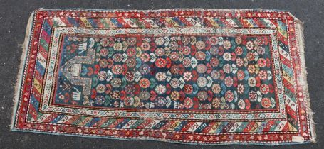 Kazak Shirvan prayer rug or runner, the repeating polychrome flower motifs on blue ground within