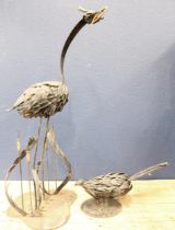 Large free standing wrought iron garden ornamental sculpture of a water bird holding a fish,