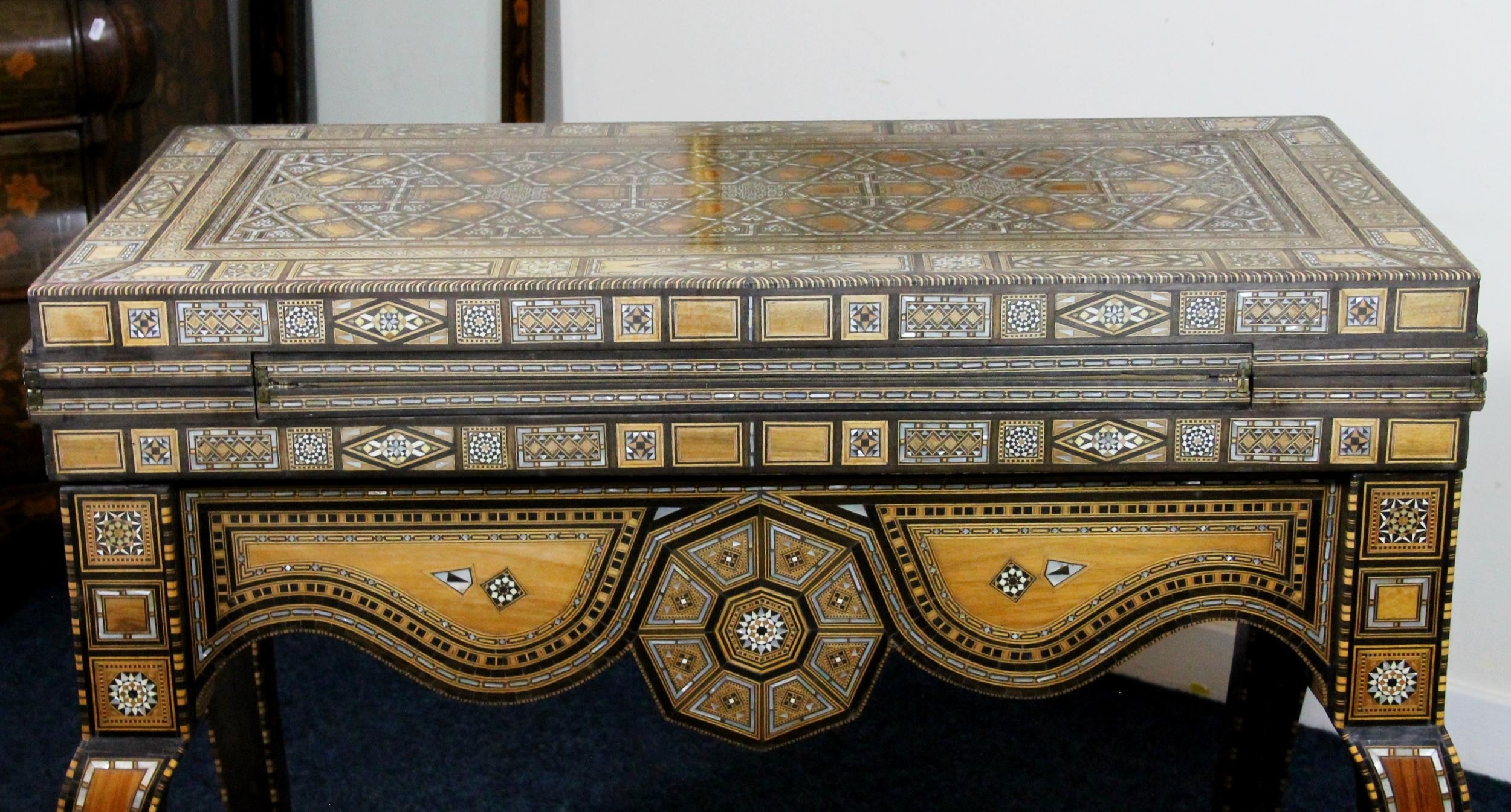 Syrian folding games table of Moorish design, mid 20th century, the elaborately inlaid mother of - Image 3 of 8