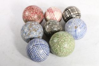 Eight glazed Victorian carpet balls, max D7cm.