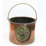 Copper and brass coal bucket, with embossed brass coat of arms to front, riveted border and metal