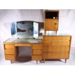 Three piece teak bedroom suite in the manner of BCM Bath Cabinet Makers, mid 20th century,
