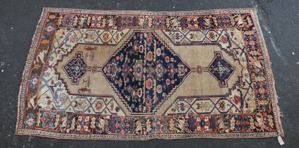 Persian Serab type rug, geometric central medallion on muted beige ground, within conforming