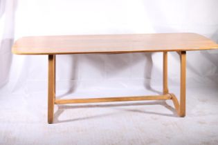 Ercol 513 shape elm and beech dining table, c1960s, the rounded elm rectangular top over a shaped