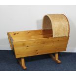 20th century Orkney rocking crib, with woven rush hood above pine cradle, max L54cm.
