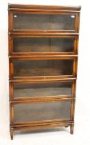 20th century oak Globe Wernicke style five-tier bookcase, with up and over glazed doors on plinth