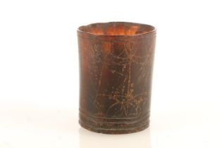 Small horn cup, late 19th century, with faded half circle etched design to the body, H5.2cm.